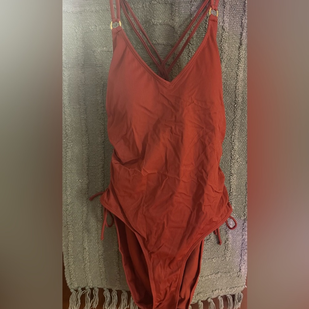 Red orange, open back swim suit, size XL (16/18). One piece
